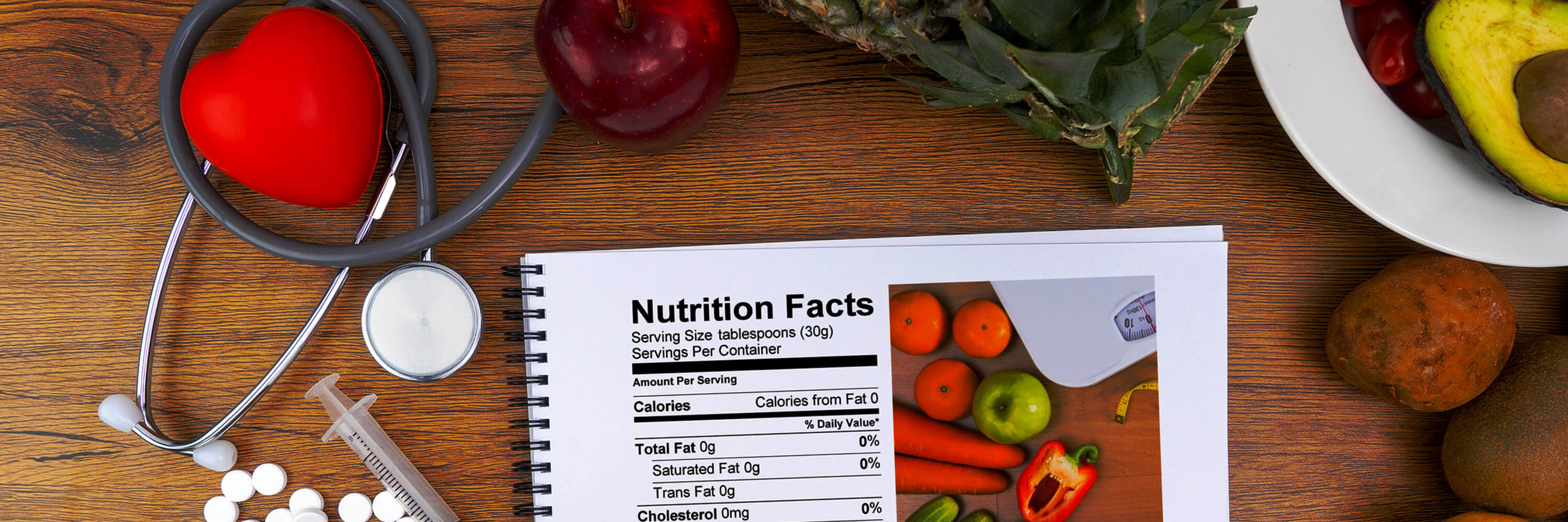 nutrition facts next to array of fruit and vegetables