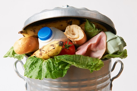 food in trash can