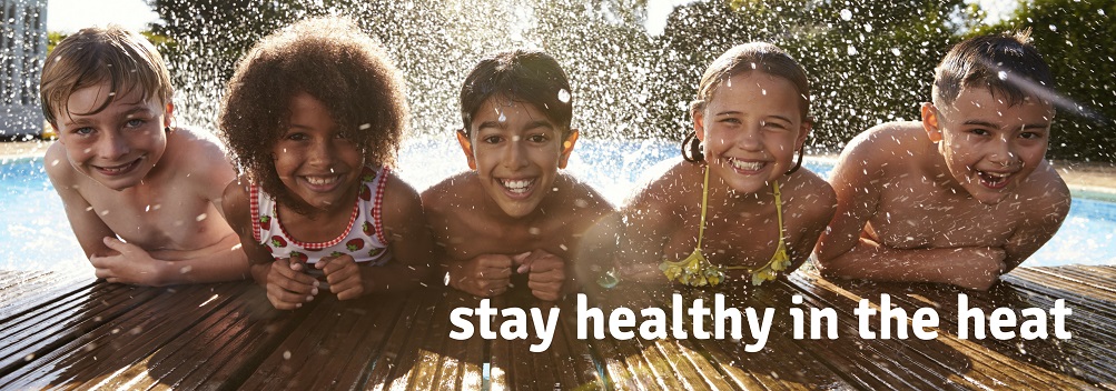 Five kids kicking water in the pool | Stay healthy in the heat