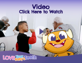 A grandpa, his young grandson and granddaughter brushing their teeth in front of a mirror with a smiling animated character