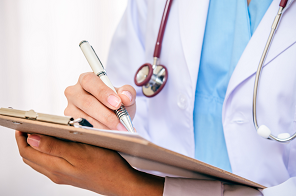 image of a doctor writing notes